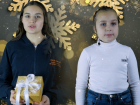Сестренки Варя и Серафима Подольские поздравляют волгодонцев с наступающим Новым годом