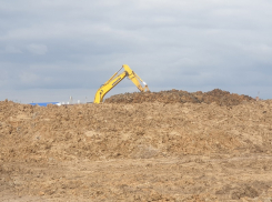 Грунтом из-под нового моста перекроют доступ кислорода пожарам на старой свалке
