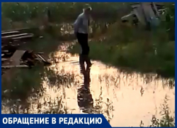 Дворы жителей станицы Романовской после ливневых дождей превращаются в болота